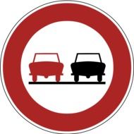 traffic sign indicates that overtaking is prohibited