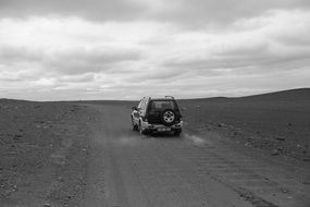 jeep on an empty road in iceland