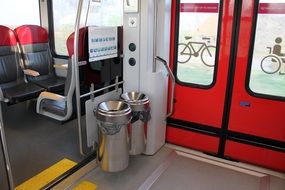 metal trashcans in arriva spurt train, netherlands