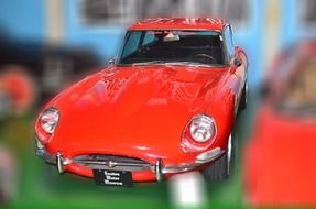 red car on blurred background