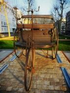 vintage tricycle, sculpture in park