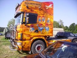 colorful orange airbrush truck