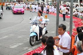 policeman on a motorcycle at the festival in thailand