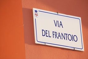 street name sign on wall, italy, rome