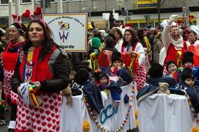 people in costumes at street carnival