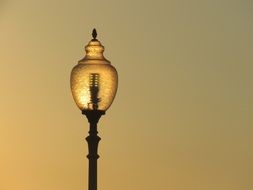 street lamp in yellow twilight