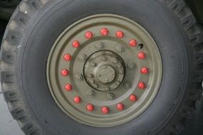 tire with red bolts