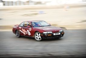 burgundy sports car nissan silvia