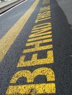 Yellow "Waiting" sign