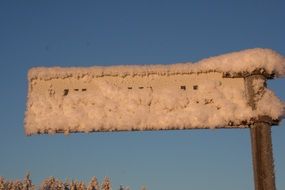 winter frost road sign