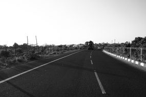 black and white photo of a highway to Gujarat, India