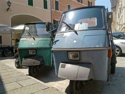 apecar piaggio on sunny streets in italy