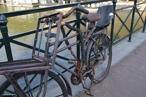 metal bike stands near the fence