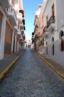 cobblestone pavement on empty alley, Puerto Rico, old san juan