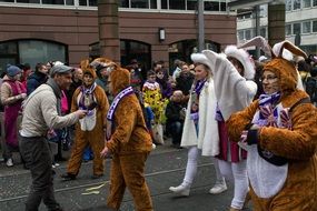 people in animal costumes at the festival