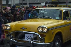 yellow car at the festival