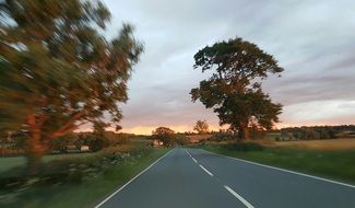 journey on the highway at sunset