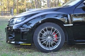 front wheel on a black car