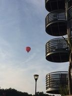 red hot air balloon and balconies