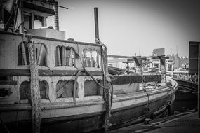 boat in port in black and white image