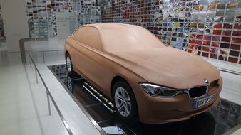 beige BMW in a museum in Munich