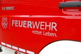 The door of the fire truck with the inscription 