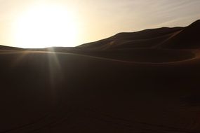 sun over the mountain ridge