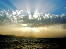 sun rays through clouds