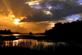 sunset above lake clouds landscape nature