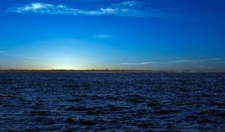 dark blue ocean water after sunset