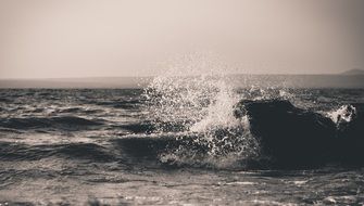 wave splash in ocean water black and white