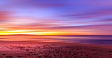 purple yellow sunset on the beach