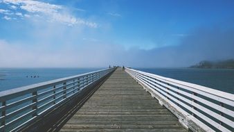 long boardwalk at the ocean