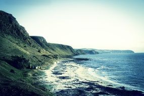 green mountains on the coast
