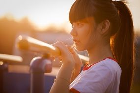 young women portrait in the sunset