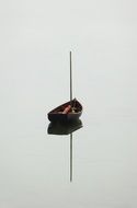 boat on a calm lake in scotland