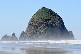 rock in the pacific ocean off the coast of Cannon Beach, Oregon