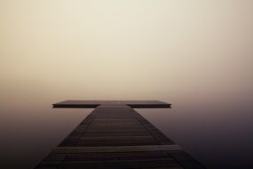 wooden jetty and fog