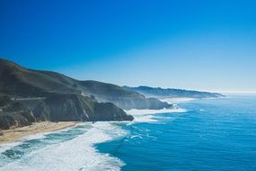 ocean coast with hills