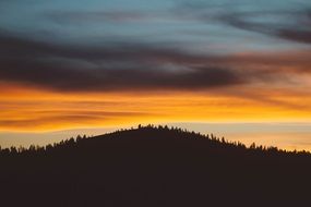 hill silhouette in the sunset