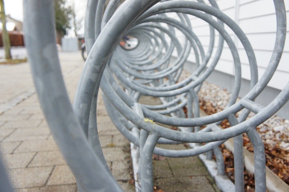 gray metal bicycle racks closeup