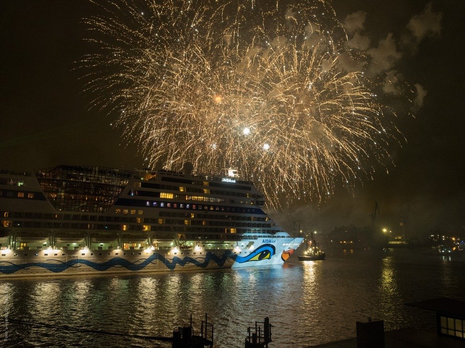 fireworks over a cruise ship in hamburg