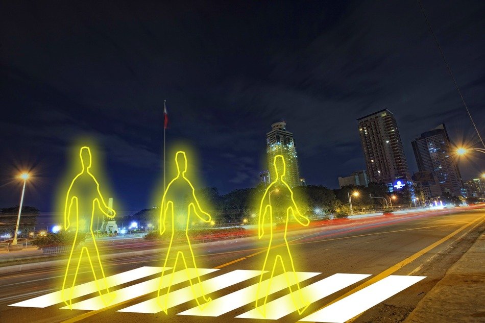 zebra crossing and glowing human silhouettes, installation