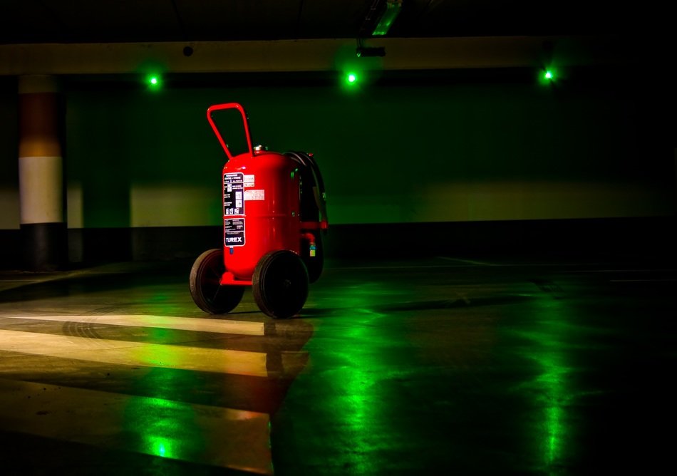 Wheeled fire extinguisher in parking