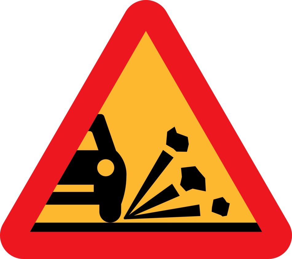 Loose chippings, traffic sign