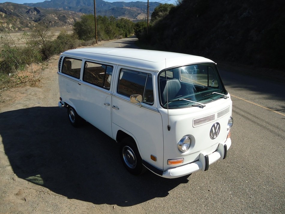 white Volkswagen on the road