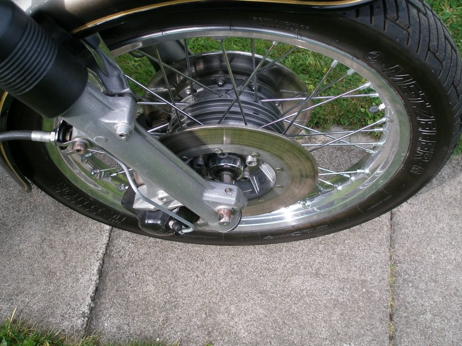 shiny wheel of a motorcycle close-up