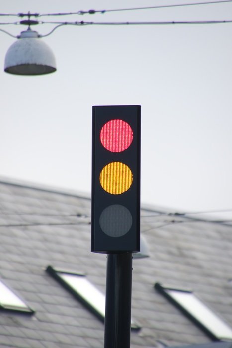 traffic lights with signal lights near the road