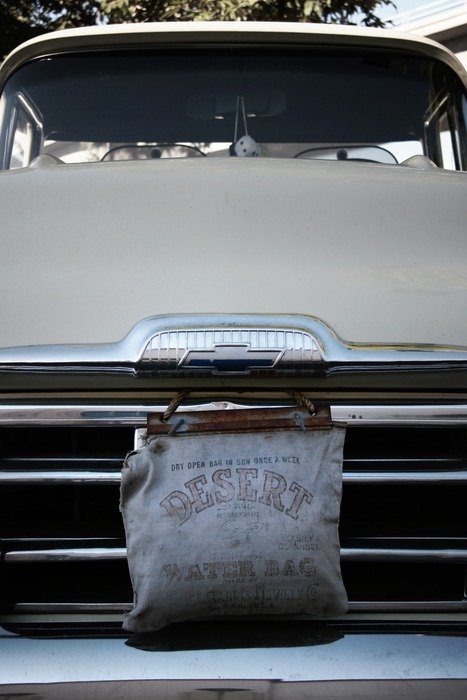 water bag on vintage car grill