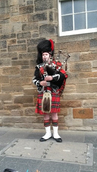 musician in costume in scotland